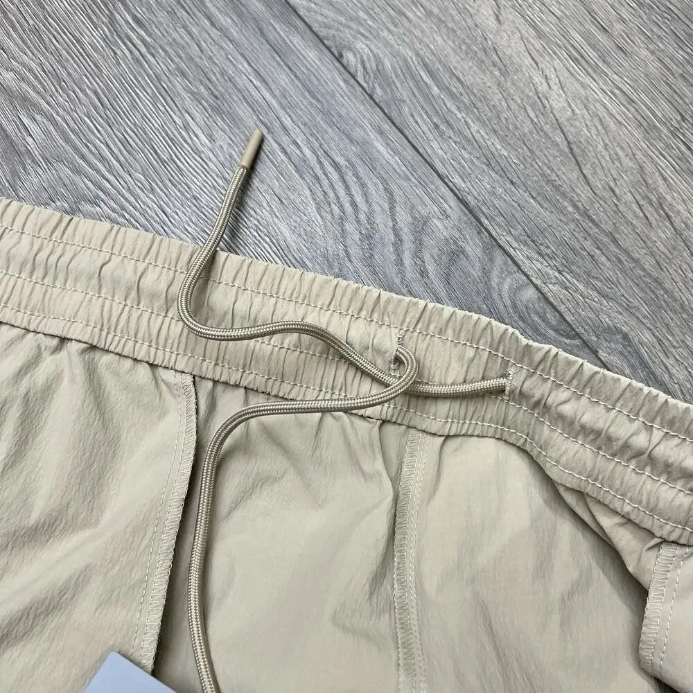 New Balance Jogger Pants Size 2XL Mens Stoneware Beige Athletic Stretch Woven